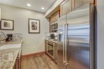 Stainless Steel Appliances in a One Bedroom at One Ski Hill